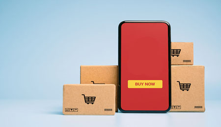 Concept,Online,Sopping.,Boxes,And,Shopping,Bag,With,Smartphone,Online